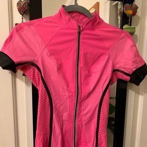 Lululemon short sleeve cycling biking jersey fluorescent pink small/4. GUC